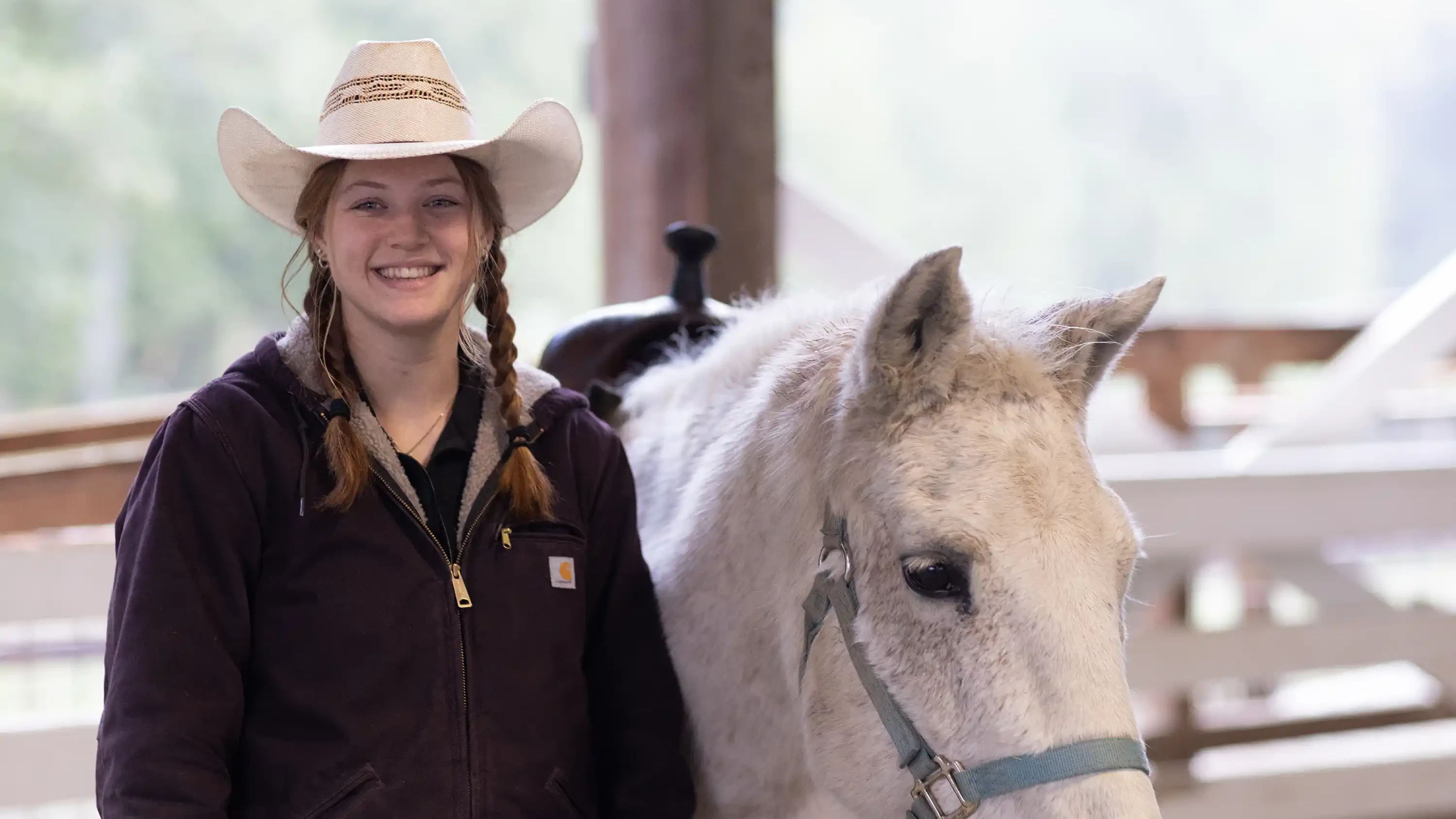 Miracle Ranch - Christian Youth Summer Retreats - Counselor walking horse