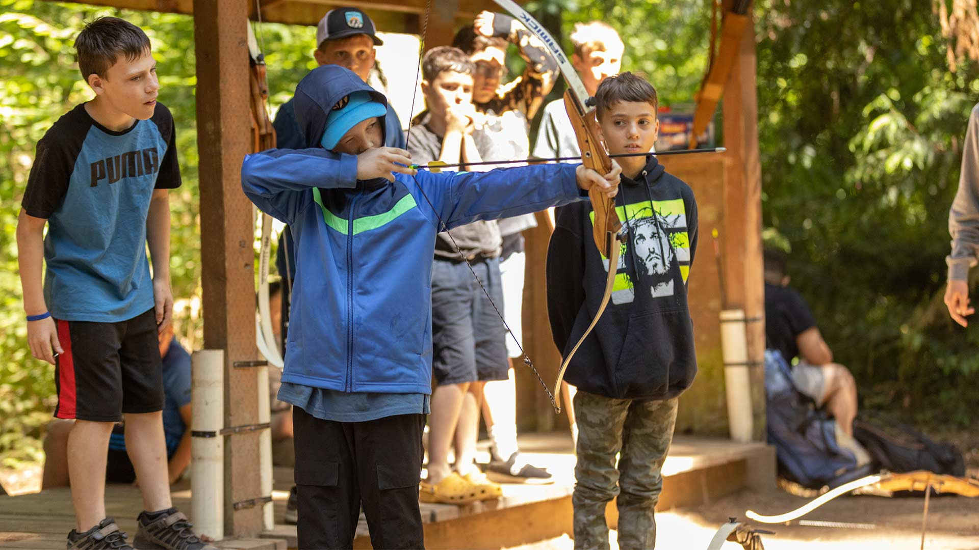 CRISTA Camps Youth - Boys Practicing Archery